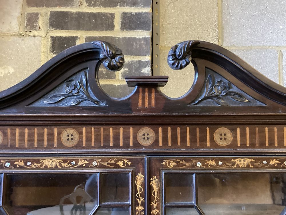 An Edwardian marquetry inlaid mahogany bow front display cabinet, width 92cm, depth 47cm, height 196cm